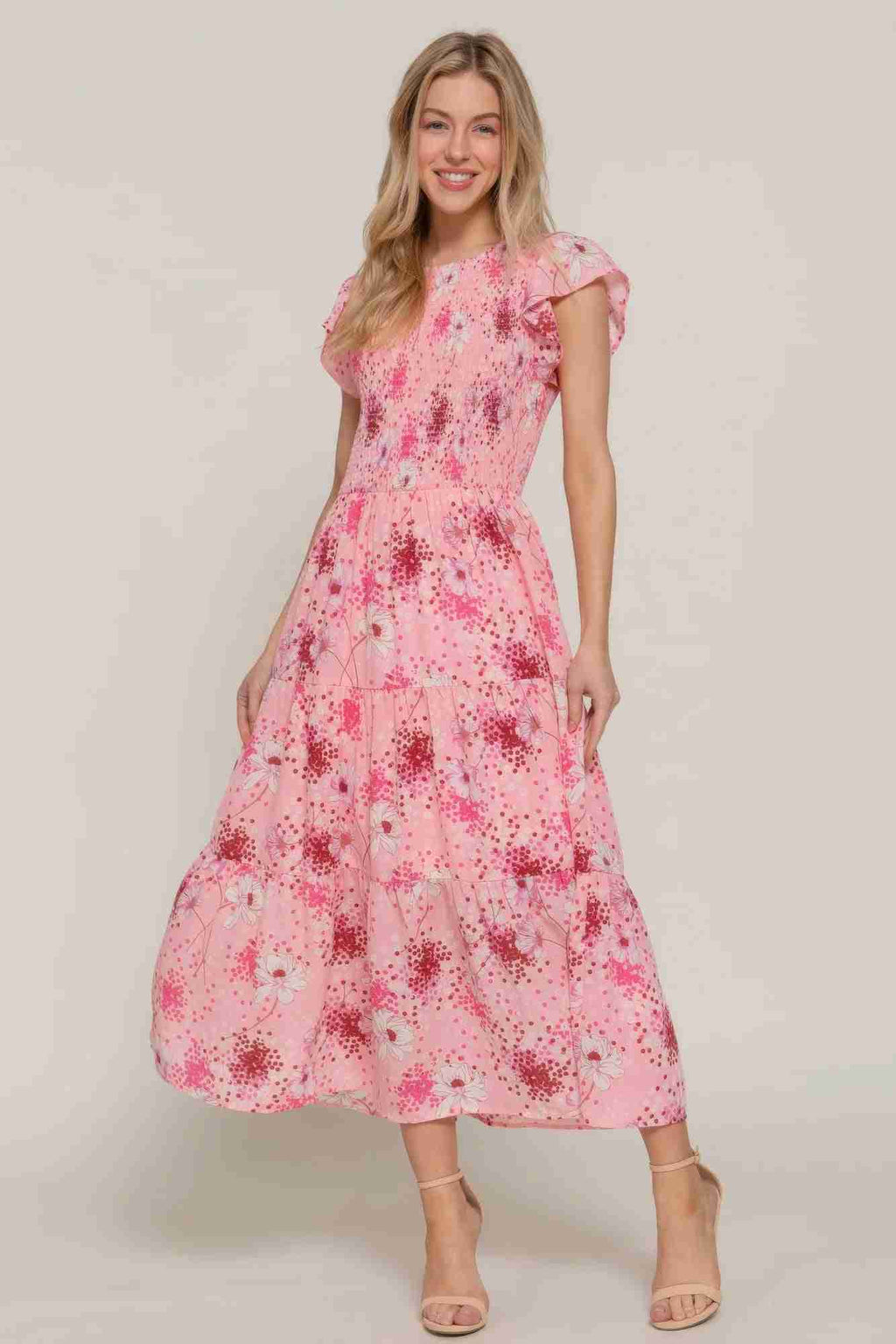 Robe florale smockée rose à manches à volants et jupe évasée mi-longue