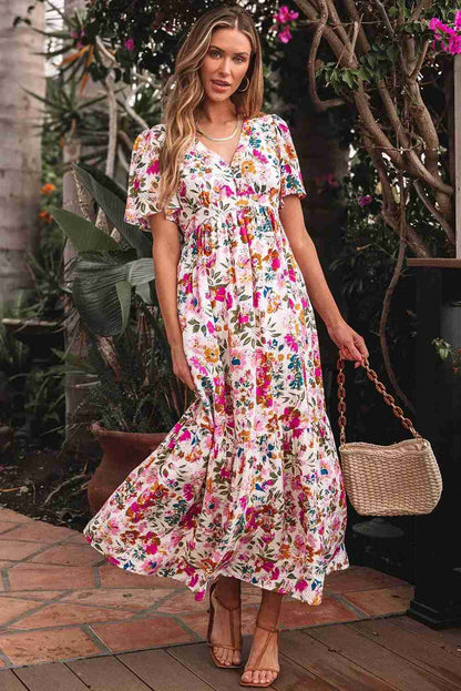 Robe longue fleurie à col V et manches courtes, taille froncée