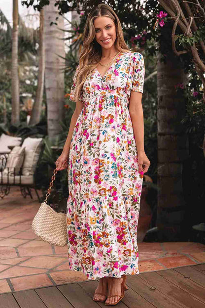 Robe maxi fleurie col V, taille froncée et jupe ample