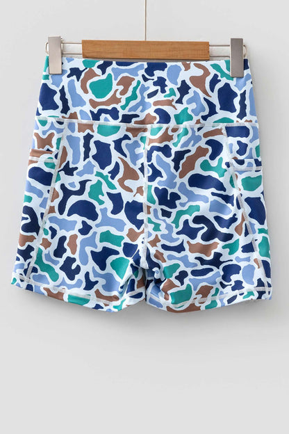 Short cycliste imprimé camouflage bleu, couture visible, taille et ourlet élastiques.