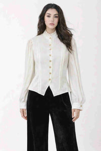 Haut en satin blanc à col montant et boutons dorés, manches longues bouffantes