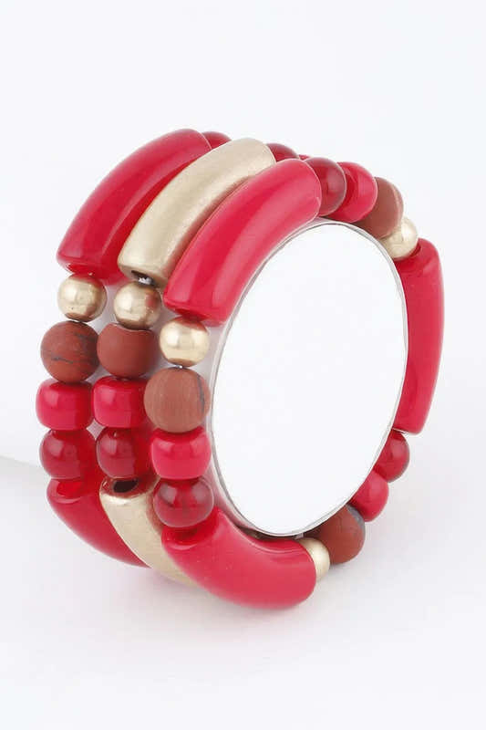 Bracelet de perles rouges et crème, perles dorées et perles ovales.