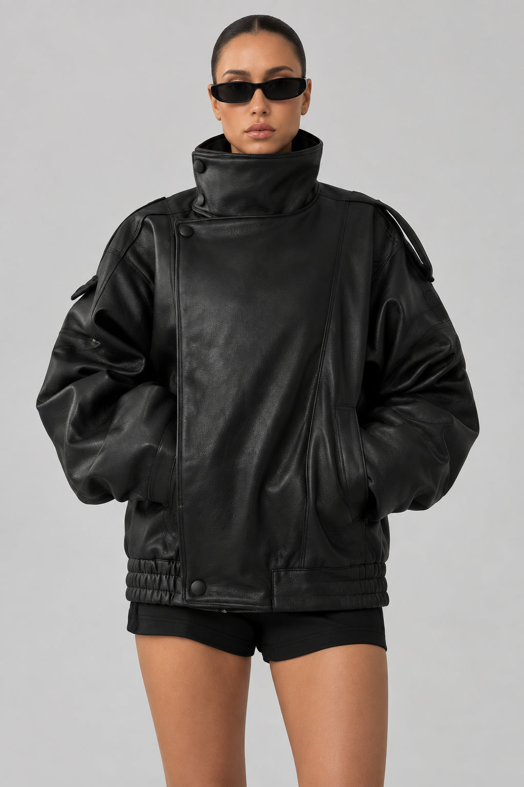 Veste longue femme en faux cuir noir, col montant et coupe ample – vue 1